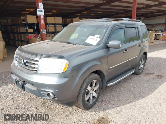 2013 Honda Pilot Touring with VIN 5FNYF3H92DB001308, listed as a IAAI auction lot 42007426 with 225,869 mi miles and . Bid and sale history available at DreamBid. Image 2.