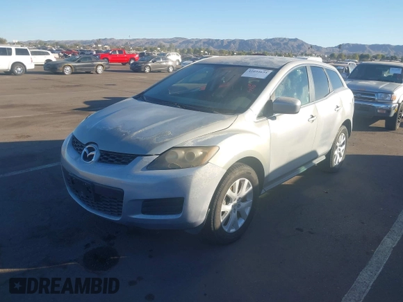 2009 Mazda CX-7 Sport with VIN JM3ER293190233927, listed as a IAAI auction lot 41054654 with 103,137 mi miles. Bid and sale history available at carsss.com. Image 2.
