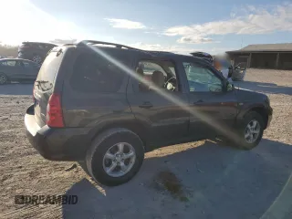 2006 Mazda Tribute S with VIN 4F2YZ04116KM23873, listed as a Copart auction lot 79926084 with 67,142 mi miles and Salvage Title. Bid and sale history available at DreamBid. Image 3.
