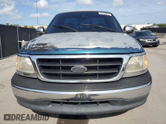 2000 Ford F-150 XL z VIN 3FTZF172XYMA81391, wystawiony jako Copart lot #62108855 z przebiegiem Nie podano mil oraz Szkoda całkowita • Salvage title. Historia ofert i sprzedaży dostępna na DreamBid. Obrazek 5.
