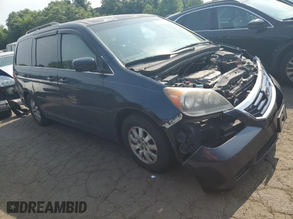 2010 Honda Odyssey EX-L z VIN 5FNRL3H73AB089714, wystawiony jako Copart lot #60276305 z przebiegiem 125 025 mil mil oraz Szkoda całkowita • Salvage title. Historia ofert i sprzedaży dostępna na DreamBid. Obrazek 4.