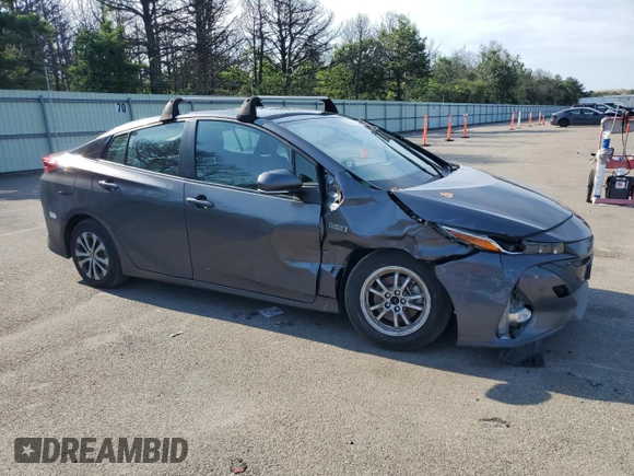 2021 Toyota Prius LE with VIN JTDKAMFP3M3166034, listed as a Copart auction lot 63271275 with 52,536 mi miles and Salvage title. Bid and sale history available at DreamBid. Image 4.