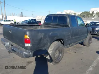2000 Toyota Tundra SR5 with VIN 5TBRT3419YS114034, listed as a IAAI auction lot 41284071 with 200,797 mi miles and . Bid and sale history available at DreamBid. Image 4.