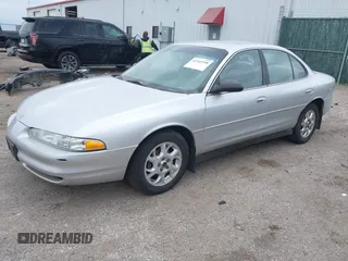 2002 Oldsmobile Intrigue GX z VIN 1G3WH52H22F149397, wystawiony jako IAAI lot #42265108 z przebiegiem 107 834 mil mil oraz . Historia ofert i sprzedaży dostępna na DreamBid. Obrazek 2.