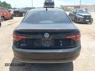 2020 Volkswagen Jetta SEL z VIN 3VWEB7BU2LM052964, wystawiony jako IAAI lot #42316780 z przebiegiem 79 929 mil mil oraz . Historia ofert i sprzedaży dostępna na DreamBid. Obrazek 17.