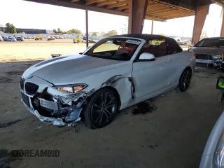 2016 BMW 2 Series 228i with VIN WBA1K9C53GV710823, listed as a Copart auction lot 84087434 with 70,822 mi miles and Salvage Title. Bid and sale history available at carsss.com. Image 1.