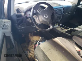 2010 Nissan Titan Pro-4X with VIN 1N6BA0EC3AN312601, listed as a Copart auction lot 52633455 with 161,260 mi miles and Salvage title. Bid and sale history available at DreamBid. Image 8.