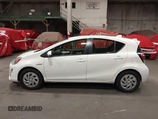 2016 Toyota Prius One z VIN JTDKDTB33G1121647, wystawiony jako IAAI lot #42020194 z przebiegiem 72 535 mil mil oraz . Historia ofert i sprzedaży dostępna na DreamBid. Obrazek 14.
