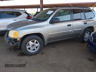 2003 GMC Envoy SLT with VIN 1GKDS13S732346641, listed as a IAAI auction lot 42111222 with 291,231 mi miles and . Bid and sale history available at DreamBid. Image 2.