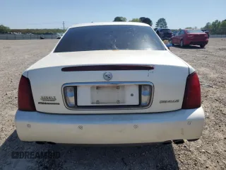 2003 Cadillac DeVille z VIN 1G6KD54Y93U258835, wystawiony jako Copart lot #52595785 z przebiegiem 215 289 mil mil oraz Szkody całkowita. Historia ofert i sprzedaży dostępna na DreamBid. Obrazek 6.