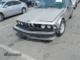 1985 BMW 6 Series 635CSi with VIN WBAEC8400F0610637, listed as a IAAI auction lot 41935412 with 129,943 mi miles. Bid and sale history available at carsss.com. Image 6.