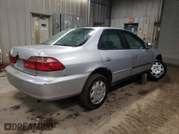 2000 Honda Accord LX z VIN 1HGCG5643YA059339, wystawiony jako Copart lot #42153695 z przebiegiem 169 380 mil mil oraz Szkoda całkowita • Salvage title. Historia ofert i sprzedaży dostępna na DreamBid. Obrazek 3.