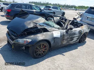 2005 Honda S2000 z VIN JHMAP21405S006517, wystawiony jako IAAI lot #42071234 z przebiegiem Nie podano mil oraz . Historia ofert i sprzedaży dostępna na DreamBid. Obrazek 13.