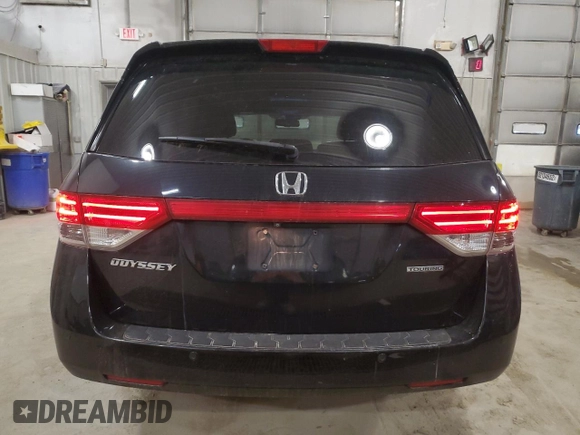 2014 Honda Odyssey Touring z VIN 5FNRL5H91EB128917, wystawiony jako Copart lot #49353085 z przebiegiem 208 871 mil mil oraz Czysty tytuł • Clean title. Historia ofert i sprzedaży dostępna na DreamBid. Obrazek 6.