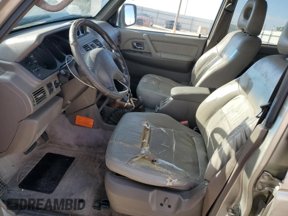 1998 Mitsubishi Montero z VIN JA4MR51R0WJ000921, wystawiony jako Copart lot #56250965 z przebiegiem 181 293 mil mil oraz Szkoda całkowita • Salvage title. Historia ofert i sprzedaży dostępna na DreamBid. Obrazek 7.