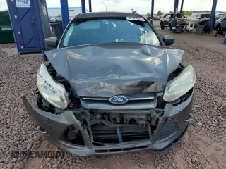 2012 Ford Focus SE z VIN 1FAHP3K24CL338153, wystawiony jako Copart lot #56161925 z przebiegiem 167 146 mil mil oraz Szkoda całkowita • Salvage title. Historia ofert i sprzedaży dostępna na DreamBid. Obrazek 5.