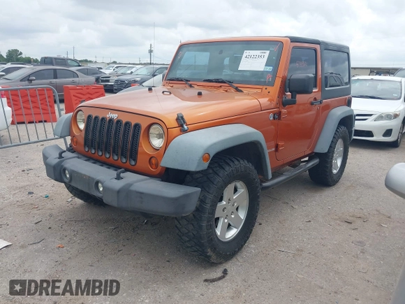 2011 Jeep Wrangler Sport with VIN 1J4AA2D1XBL579882, listed as a IAAI auction lot 42122353 with 153,885 mi miles and . Bid and sale history available at carsss.com. Image 17.
