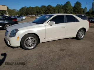 2007 Cadillac CTS with VIN 1G6DP577970122009, listed as a Copart auction lot 79976914 with 124,899 mi miles and Salvage Title. Bid and sale history available at carsss.com. Image 1.