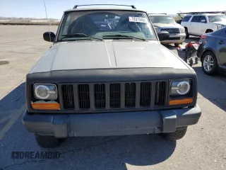 2000 Jeep Cherokee SE with VIN 1J4FF27SXYL140055, listed as a Copart auction lot 70315454 with 176,017 mi miles and Salvage title. Bid and sale history available at DreamBid. Image 5.