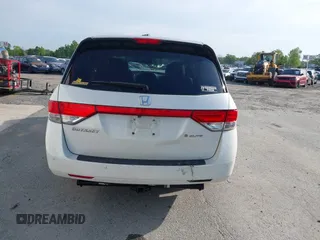 2014 Honda Odyssey Touring with VIN 5FNRL5H94EB001479, listed as a IAAI auction lot 41123678 with 147,269 mi miles and . Bid and sale history available at carsss.com. Image 16.