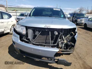 2012 Jeep Grand Cherokee Laredo with VIN 1C4RJFAG5CC222569, listed as a Copart auction lot 53264185 with 153,921 mi miles and Salvage Title. Bid and sale history available at carsss.com. Image 5.