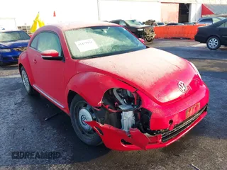 2014 Volkswagen Beetle 2.5L w/Sun with VIN 3VWJP7AT8EM629573, listed as a IAAI auction lot 41479054 with 73,950 mi miles and . Bid and sale history available at DreamBid. Image 6.