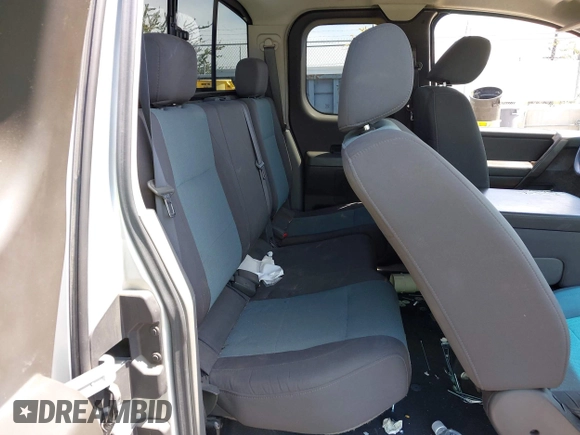2006 Nissan Titan SE with VIN 1N6AA06A06N542516, listed as a IAAI auction lot 42736458 with 157,824 mi miles and . Bid and sale history available at DreamBid. Image 8.