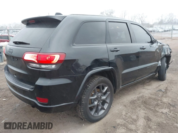 2021 Jeep Grand Cherokee 80th Anniversary with VIN 1C4RJFBG2MC614814, listed as a IAAI auction lot 41486793 with 88,089 mi miles and . Bid and sale history available at DreamBid. Image 4.