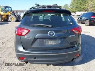 2013 Mazda CX-5 Sport z VIN JM3KE4BE3D0141748, wystawiony jako IAAI lot #41836498 z przebiegiem 163 118 mil mil oraz . Historia ofert i sprzedaży dostępna na DreamBid. Obrazek 16.