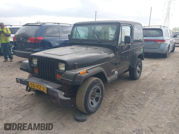 1995 Jeep Wrangler S with VIN 1J4FY19P4SP242027, listed as a IAAI auction lot 42149833 with 158,695 mi miles. Bid and sale history available at carsss.com. Image 2.