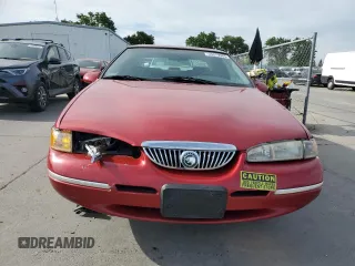 1997 Mercury Cougar z VIN 1MELM62W6VH618680, wystawiony jako Copart lot #53379985 z przebiegiem 123 474 mil mil oraz Szkody całkowita. Historia ofert i sprzedaży dostępna na DreamBid. Obrazek 5.