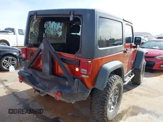 2014 Jeep Wrangler Rubicon with VIN 1C4BJWCG8EL185597, listed as a IAAI auction lot 41914489 with 85,545 mi miles and . Bid and sale history available at DreamBid. Image 4.