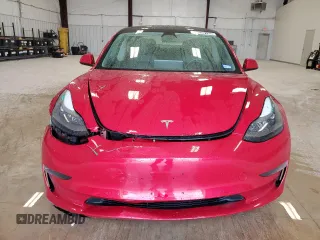 2022 Tesla Model 3 Long Range with VIN 5YJ3E1EBXNF285779, listed as a Copart auction lot 54630135 with 129,097 mi miles and Clean Title. Bid and sale history available at DreamBid. Image 5.
