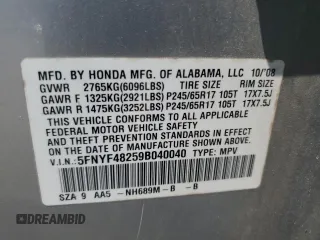 2009 Honda Pilot LX with VIN 5FNYF48259B040040, listed as a Copart auction lot 59860445 with 213,459 mi miles and Salvage title. Bid and sale history available at DreamBid. Image 14.