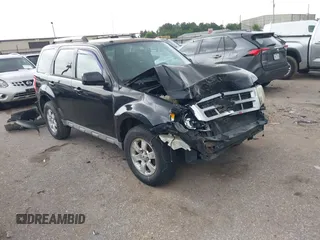 2009 Ford Escape Limited with VIN 1FMCU04779KB54792, listed as a IAAI auction lot 42629083 with 148,350 mi miles and . Bid and sale history available at DreamBid. Image 1.