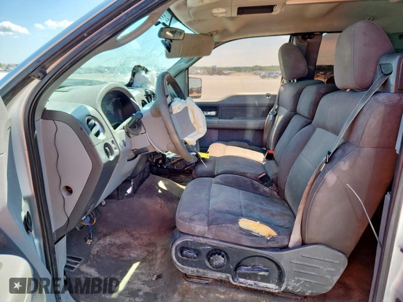 2006 Ford F-150 XL with VIN 1FTPX12V16NB79069, listed as a Copart auction lot 62731485 with 215,056 mi miles and Salvage title. Bid and sale history available at DreamBid. Image 7.