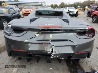 2018 Ferrari 488 z VIN ZFF80AMA6J0231516, wystawiony jako Copart lot #79886954 z przebiegiem Nie podano mil oraz Szkody całkowita. Historia ofert i sprzedaży dostępna na DreamBid. Obrazek 6.