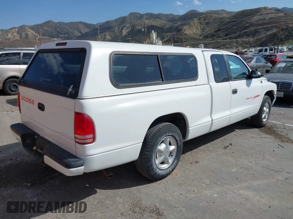1999 Dodge Dakota with VIN 1B7FL22P0XS288012, listed as a IAAI auction lot 41695852 with 150,431 mi miles. Bid and sale history available at carsss.com. Image 4.