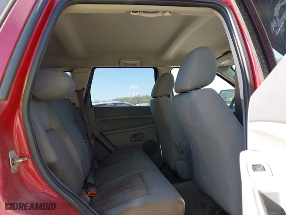 2006 Jeep Grand Cherokee Laredo with VIN 1J4HR48N56C112794, listed as a IAAI auction lot 42008002 with 207,065 mi miles. Bid and sale history available at carsss.com. Image 8.