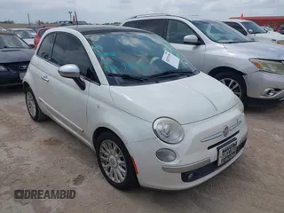 2012 FIAT 500 Lounge z VIN 3C3CFFCR0CT295931, wystawiony jako IAAI lot #42079398 z przebiegiem 118 627 mil mil oraz . Historia ofert i sprzedaży dostępna na DreamBid. Obrazek 1.