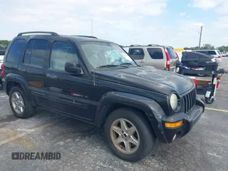 2003 Jeep Liberty Limited with VIN 1J4GK58K13W719457, listed as a IAAI auction lot 42088672 with 179,214 mi miles and . Bid and sale history available at carsss.com. Image 1.