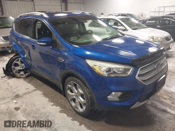 2018 Ford Escape Titanium with VIN 1FMCU9J99JUB94925, listed as a IAAI auction lot 42412800 with 95,880 mi miles and . Bid and sale history available at DreamBid. Image 1.