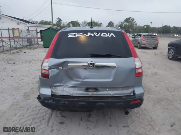 2009 Honda CR-V EX-L with VIN JHLRE387X9C006124, listed as a IAAI auction lot 41757092 with 142,038 mi miles. Bid and sale history available at carsss.com. Image 16.