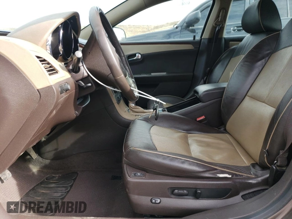 2012 Chevrolet Malibu LTZ with VIN 1G1ZG5E79CF280906, listed as a Copart auction lot 48709325 with 111,704 mi miles and Salvage Title. Bid and sale history available at DreamBid. Image 7.