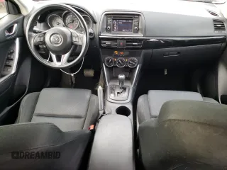 2014 Mazda CX-5 Sport with VIN JM3KE2BE9E0372370, listed as a Copart auction lot 58980165 with 175,477 mi miles and Salvage title. Bid and sale history available at DreamBid. Image 8.