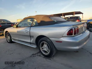 1998 Ford Mustang with VIN 1FAFP4444WF212096, listed as a Copart auction lot 87106074 with 107,664 mi miles and Clean Title. Bid and sale history available at carsss.com. Image 2.