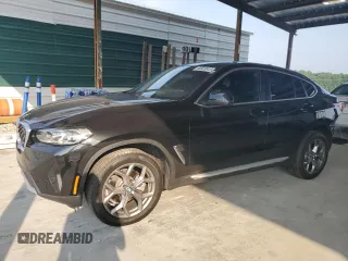 2024 BMW X4 xDrive30i with VIN 5UX33DT01R9U60783, listed as a Copart auction lot 60520915 with 5,403 mi miles and Salvage title. Bid and sale history available at DreamBid. Image 1.