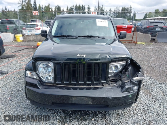 2012 Jeep Liberty Sport z VIN 1C4PJMAK7CW175981, wystawiony jako IAAI lot #42317545 z przebiegiem 75 211 mil mil oraz . Historia ofert i sprzedaży dostępna na DreamBid. Obrazek 12.
