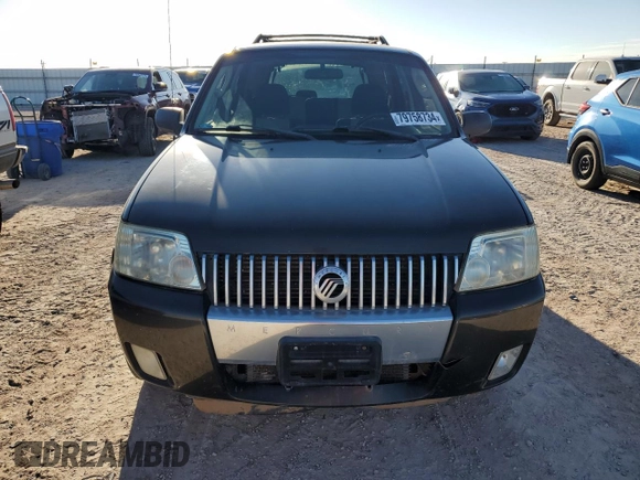 2005 Mercury Mariner Luxury z VIN 4M2CU56125DJ20570, wystawiony jako Copart lot #79758734 z przebiegiem 74 370 mil mil oraz Tytuł czysty. Historia ofert i sprzedaży dostępna na DreamBid. Obrazek 5.