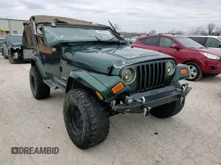2000 Jeep Wrangler Sahara z VIN 1J4FA59S5YP803327, wystawiony jako Copart lot #44382505 z przebiegiem Nie podano mil oraz Szkoda całkowita • Salvage title. Historia ofert i sprzedaży dostępna na DreamBid. Obrazek 12.